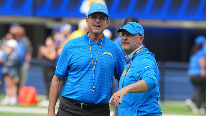 Los Angeles Chargers coach Jim Harbaugh and general manager Joe Hortiz.