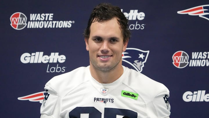 Oct 18, 2024; London, United Kingdom; New England Patriots tight end Hunter Henry (85) at press conference at the Harrow School. Mandatory Credit: Kirby Lee-Imagn Images