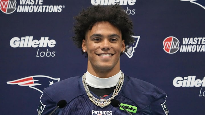 Oct 18, 2024; London, United Kingdom; New England Patriots cornerback Christian Gonzalez (0) at press conference at the Harrow School. Mandatory Credit: Kirby Lee-Imagn Images Oct 18, 2024; London, United Kingdom; New England Patriots cornerback Christian Gonzalez (0) at press conference at the Harrow School. Mandatory Credit: Kirby Lee-Imagn Images