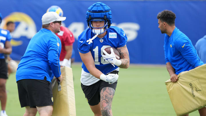 Jun 3, 2025; Woodland Hills, CA, USA; Los Angeles Rams tight end Terrance Ferguson (18) carries the ball during organized team activities at Rams Practice Facility. Mandatory Credit: Kirby Lee-Imagn Images