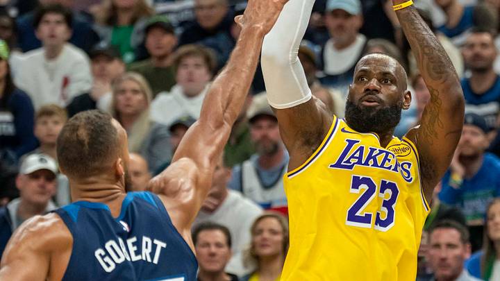 Apr 25, 2025; Minneapolis, Minnesota, USA; Los Angeles Lakers forward LeBron James (23) shoots the ball over Minnesota Timberwolves center Rudy Gobert (27) in the first half during game three of first round for the 2024 NBA Playoffs at Target Center. Mandatory Credit: Jesse Johnson-Imagn Images Apr 25, 2025; Minneapolis, Minnesota, USA; Los Angeles Lakers forward LeBron James (23) shoots the ball over Minnesota Timberwolves center Rudy Gobert (27) in the first half during game three of first round for the 2024 NBA Playoffs at Target Center. Mandatory Credit: Jesse Johnson-Imagn Images