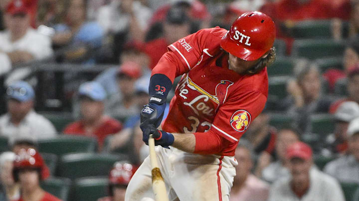 Jun 6, 2025; St. Louis, Missouri, USA;  St. Louis Cardinals second baseman Brendan Donovan (33) hits a two run single against the Los Angeles Dodgers during the fifth inning at Busch Stadium. Mandatory Credit: Jeff Curry-Imagn Images