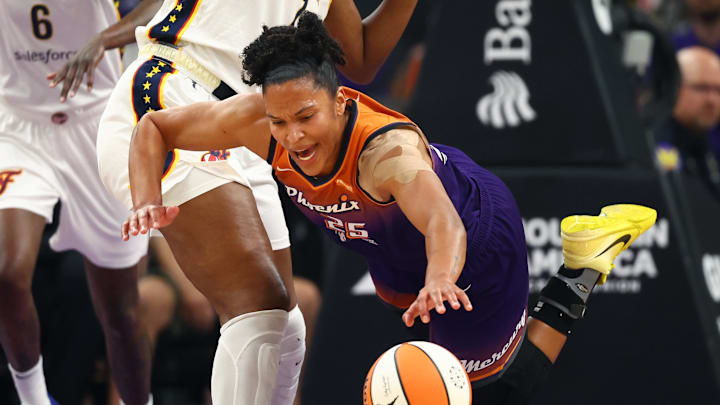 Aug 7, 2025; Phoenix, Arizona, USA; Phoenix Mercury forward Alyssa Thomas (25) against Indiana Fever forward Aliyah Boston in the first half of a WNBA game at PHX Arena. Mandatory Credit: Mark J. Rebilas-Imagn Images