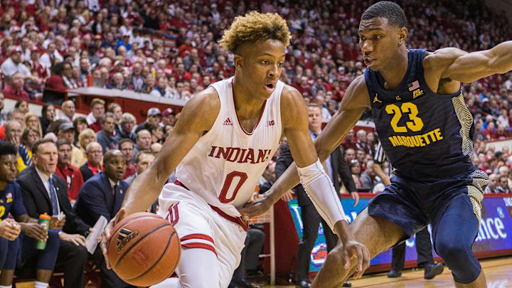 Indiana guard Romeo Langford (0) dribbles against Marquette forward Jamal Cain (23) at Assembly Hall. Indiana guard Romeo Langford (0) dribbles against Marquette forward Jamal Cain (23) at Assembly Hall.