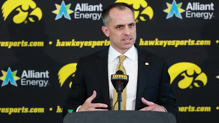 Iowa Hawkeyes head coach Ben McCollum Iowa Hawkeyes head coach Ben McCollum