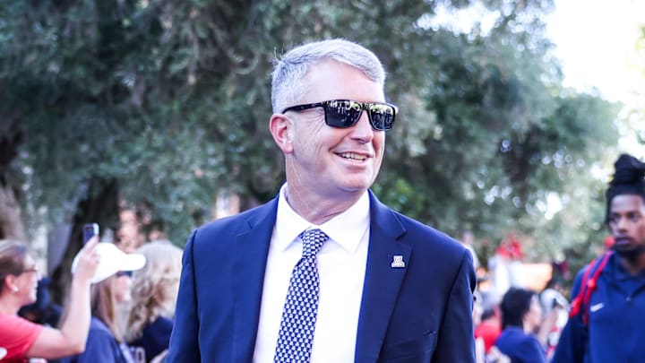 Aug 30, 2025; Tucson, Arizona, USA; Arizona Wildcats head coach Brent Brennan walks down the Wildcat Walk before the start of the game against the Hawaii Rainbow Warriors at Arizona Stadium. Mandatory Credit: Aryanna Frank-Imagn Images