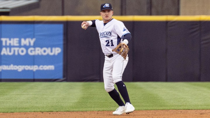 Whitecaps shortstop Kevin McGonigle looks to pass the ball to a teammate on Friday, April, 4, at LMCU Ballpark.