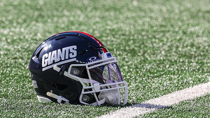Nov 3, 2024; East Rutherford, New Jersey, USA; A New York Giants helmet rests on the turf before the game between the Giants and the Washington Commanders at MetLife Stadium. Mandatory Credit: Vincent Carchietta-Imagn Images Nov 3, 2024; East Rutherford, New Jersey, USA; A New York Giants helmet rests on the turf before the game between the Giants and the Washington Commanders at MetLife Stadium. Mandatory Credit: Vincent Carchietta-Imagn Images