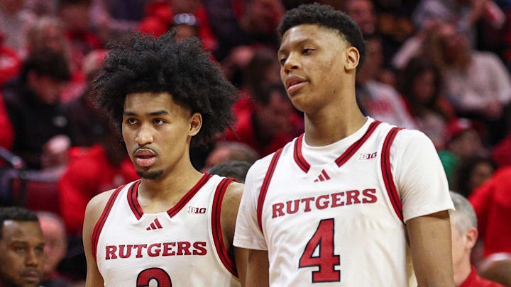 Mar 9, 2025; Piscataway, New Jersey, USA; Rutgers Scarlet Knights guard Dylan Harper (2) and Rutgers Scarlet Knights guard Ace Bailey (4) during a time out during the second half against the Minnesota Golden Gophers at Jersey Mike's Arena. Mandatory Credit: Vincent Carchietta-Imagn Images
