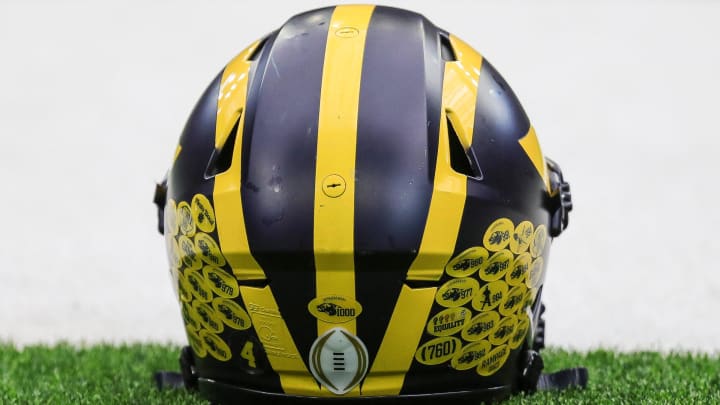 A Michigan football helmet on the sideline during open practice at NRG Stadium in Houston, Texas on Saturday, Jan. 6, 2024.