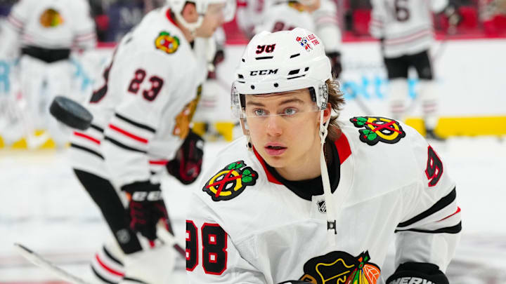 Jan 30, 2025; Raleigh, North Carolina, USA;  Chicago Blackhawks center Connor Bedard (98) watches the puck during the warmups before the game against the Carolina Hurricanes at Lenovo Center. Mandatory Credit: James Guillory-Imagn Images