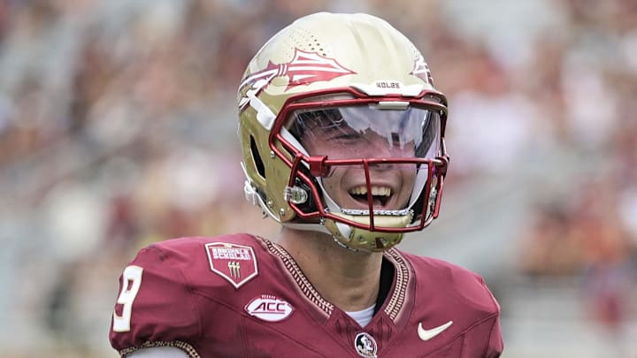 Sep 6, 2025; Tallahassee, Florida, USA; Florida State Seminoles quarterback Kevin Sperry celebrates after scoring a touchdown against the East Texas A&M Lions during the second half at Doak S. Campbell Stadium. Mandatory Credit: Melina Myers-Imagn Images