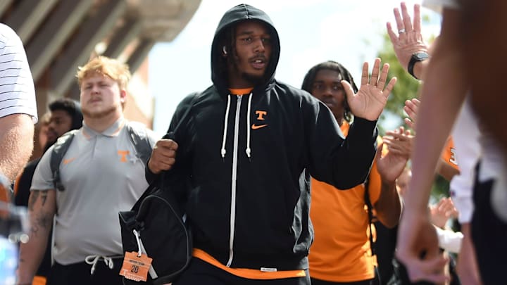 Oct 14, 2023; Knoxville, TN, USA;   Tennessee defensive lineman Bryson Eason (20) greets fans on the Vol Walk ahead of the NCAA college football game against Texas A&M on Saturday, October 14, 2023 in Knoxville, Tenn. Mandatory Credit: Saul Young-Imagn Images