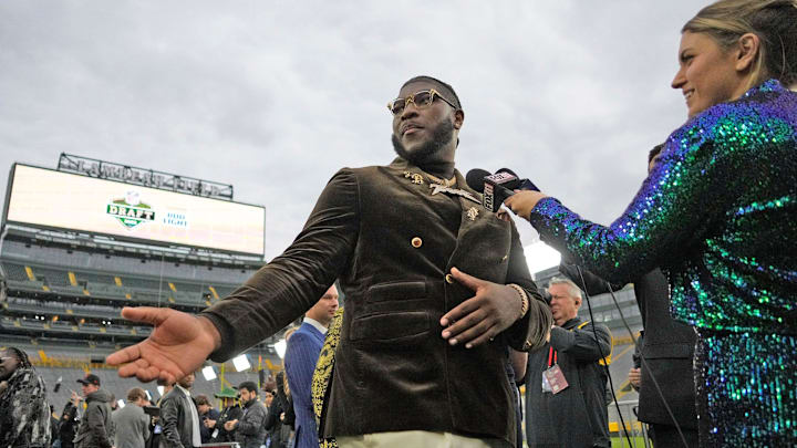 Dallas Cowboys first-round pick Tyler Booker arrives during the NFL Draft Red Carpet event at Lambeau Field.