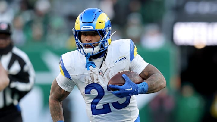 Dec 22, 2024; East Rutherford, New Jersey, USA; Los Angeles Rams running back Kyren Williams (23) runs with the ball against the New York Jets during the fourth quarter at MetLife Stadium. Mandatory Credit: Brad Penner-Imagn Images Dec 22, 2024; East Rutherford, New Jersey, USA; Los Angeles Rams running back Kyren Williams (23) runs with the ball against the New York Jets during the fourth quarter at MetLife Stadium. Mandatory Credit: Brad Penner-Imagn Images