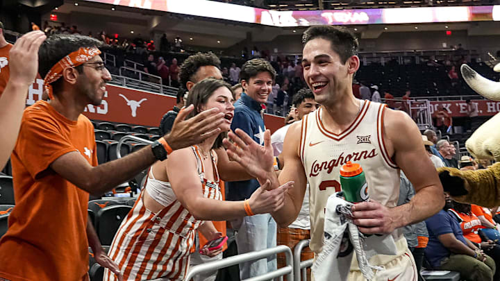 Texas Longhorns forward Brock Cunningham (30) celebrates the 81-65 win over Oklahoma State at the