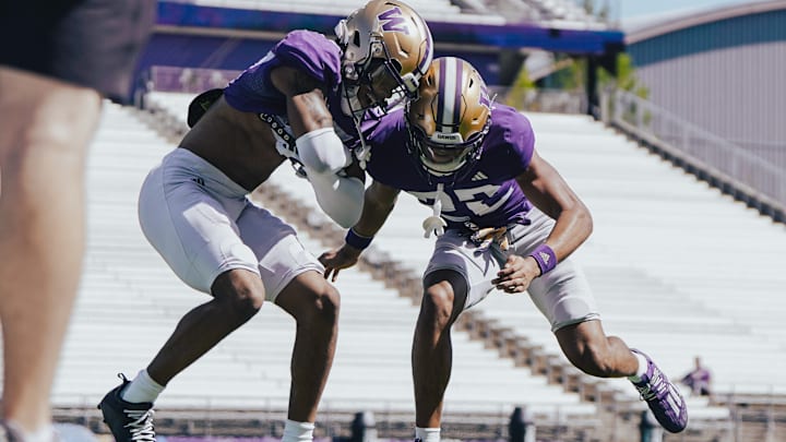 Peyton Waters goes helmet to helmet with a fellow Husky. Peyton Waters goes helmet to helmet with a fellow Husky.