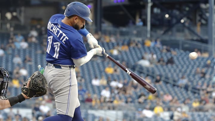 Aug 18, 2025; Pittsburgh, Pennsylvania, USA;  Toronto Blue Jays shortstop Bo Bichette (11) hits an RBI single against the Pittsburgh Pirates during the third inning at PNC Park. 