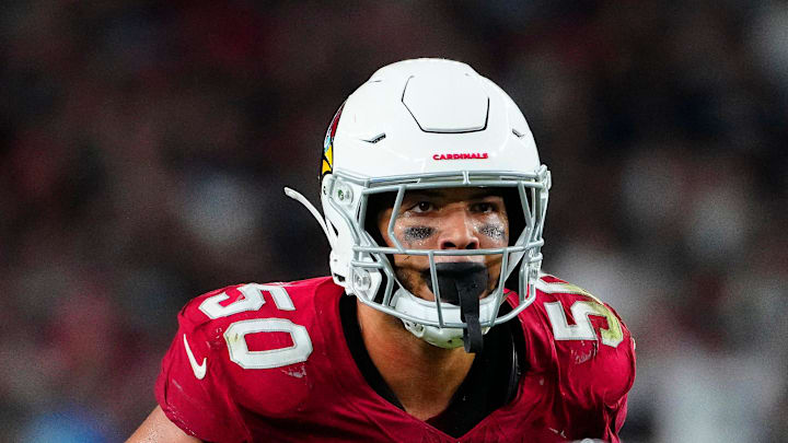 Cardinals linebacker Cody Simon (50) looks over the Raiders' offensive line during a preseason game at State Farm Stadium in Glendale on Aug. 23, 2025. Cardinals linebacker Cody Simon (50) looks over the Raiders' offensive line during a preseason game at State Farm Stadium in Glendale on Aug. 23, 2025.