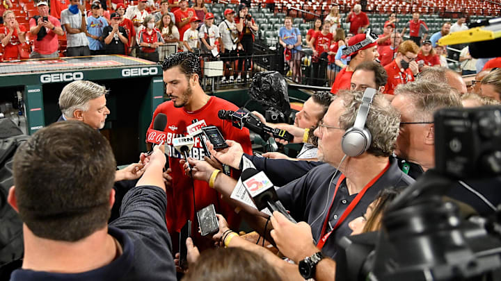 Sep 28, 2021; St. Louis, Missouri, USA;  St. Louis Cardinals third baseman Nolan Arenado (28) talks with the media after the Cardinals defeated the Milwaukee Brewers winning their 17th straight game and clinching a wild card spot in the postseason at Busch Stadium. Mandatory Credit: Jeff Curry-Imagn Images