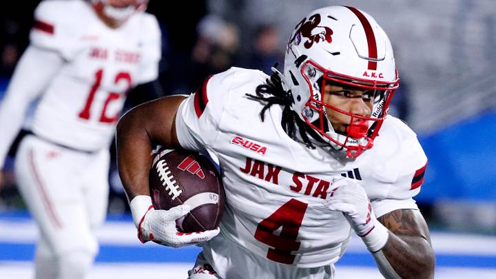 Jacksonville State running back Cam Cook (4) carries the ball during the football game against Middle Tennessee, at MTSU on Wednesday, October 29, 2025.