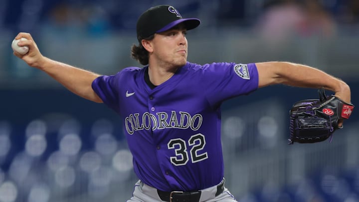 Jun 3, 2025; Miami, Florida, USA; Colorado Rockies starting pitcher Chase Dollander (32) delivers a pitch against the Miami Marlins during the first inning at loanDepot Park. Mandatory Credit: Sam Navarro-Imagn Images