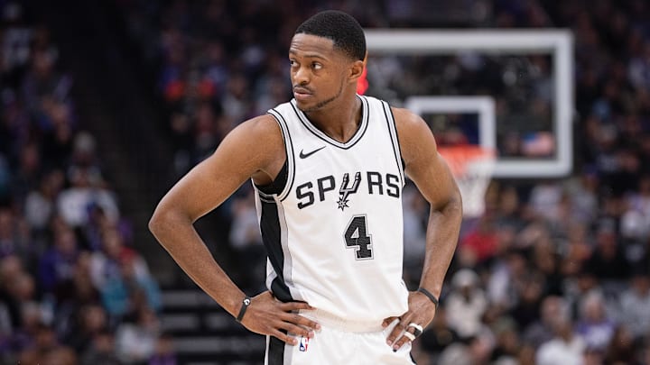 Mar 7, 2025; Sacramento, California, USA; San Antonio Spurs guard De'Aaron Fox (4) looks on during the first quarter of the game against the Sacramento Kings at Golden 1 Center. Mar 7, 2025; Sacramento, California, USA; San Antonio Spurs guard De'Aaron Fox (4) looks on during the first quarter of the game against the Sacramento Kings at Golden 1 Center.
