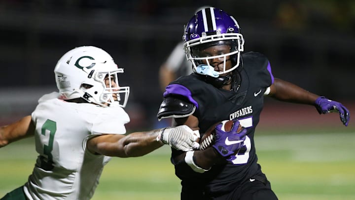 Monroe-Woodbury's Nate Coulanges (6) breaks away from Cornwall's Braden Murphy during a regular season game in 2024.