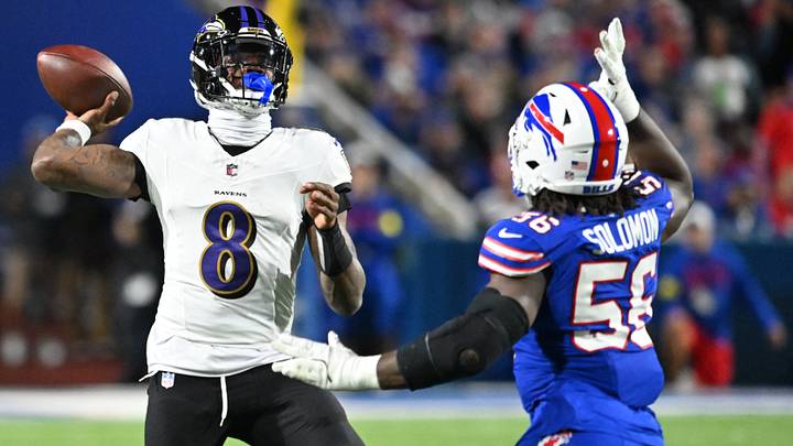 Buffalo Bills defensive end Javon Solomon (56) defends against Baltimore Ravens quarterback Lamar Jackson (8) during the first quarter at Highmark Stadium. Mandatory Credit: Mark Konezny-Imagn Images