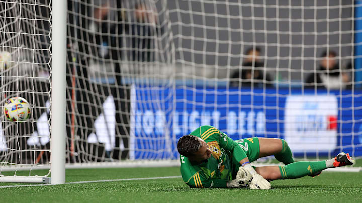 Mar 23, 2024; Charlotte, North Carolina, USA; Columbus Crew goalkeeper Evan Bush (24) gives up a