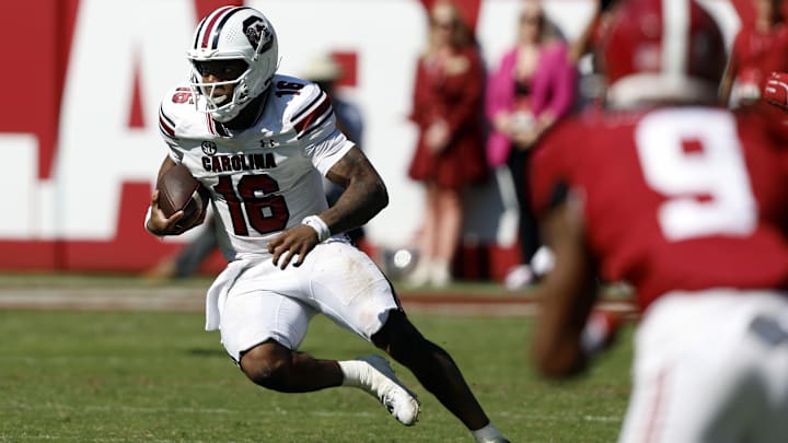 Oct 12, 2024; Tuscaloosa, Alabama, USA;  South Carolina Gamecocks quarterback LaNorris Sellers (16) scrambles for a first down against the Alabama Crimson Tide during the second half at Bryant-Denny Stadium. Mandatory Credit: Butch Dill-Imagn Images