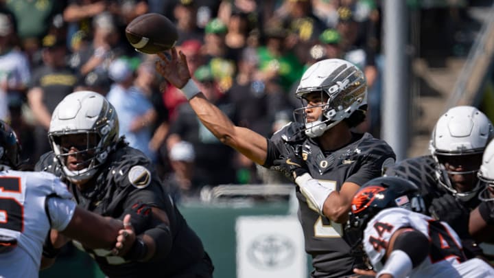 Teammates praise Dante Moore's calm in the pocket, and scouts and analysts are beginning to take notice.