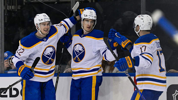 Buffalo Sabres forwards Jack Quinn, Ryan McLeod and Jason Zucker