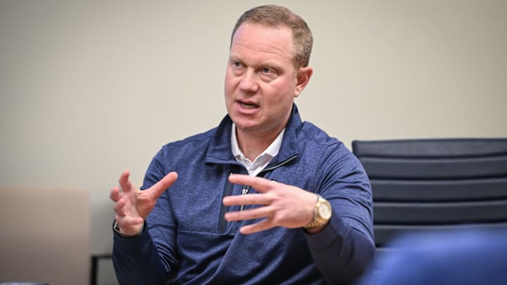 Matt Arnold, Milwaukee Brewers president of baseball operations and general manager, speaks with reporters Tuesday, February 17, 2026, at American Family Fields of Phoenix in Phoenix, Arizona.
