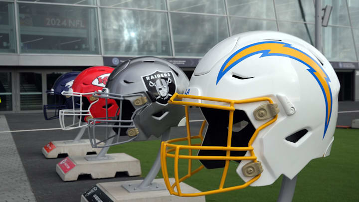 Oct 13, 2024; London, United Kingdom; Large helmets of the Los Angeles Chargers, Las Vegas Raiders, Kansas City Chiefs and Denver Broncos of the AFC West before an NFL International Series game at Tottenham Hotspur Stadium. Mandatory Credit: Kirby Lee-Imagn Images Oct 13, 2024; London, United Kingdom; Large helmets of the Los Angeles Chargers, Las Vegas Raiders, Kansas City Chiefs and Denver Broncos of the AFC West before an NFL International Series game at Tottenham Hotspur Stadium. Mandatory Credit: Kirby Lee-Imagn Images
