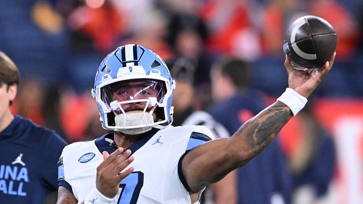 Oct 31, 2025; Syracuse, New York, USA; North Carolina Tar Heels quarterback Gio Lopez (7) warms up before a game against the Syracuse Orange at the JMA Wireless Dome. Mandatory Credit: Mark Konezny-Imagn Images