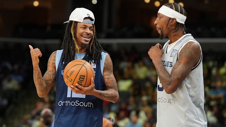 Grizzlies' Ja Morant (12) and Kentavious Caldwell-Pope (3) talk during open practice at the FedExForum on October 4, 2025, in Memphis, Tenn. Grizzlies' Ja Morant (12) and Kentavious Caldwell-Pope (3) talk during open practice at the FedExForum on October 4, 2025, in Memphis, Tenn.