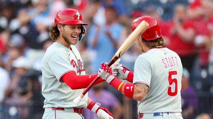 May 6, 2025; Tampa, Florida, USA; Philadelphia Phillies third baseman Alec Bohm (28) reacts with second baseman Bryson Stott (5) after hitting a two run home run against the Tampa Bay Rays in the second inning at George M. Steinbrenner Field.
