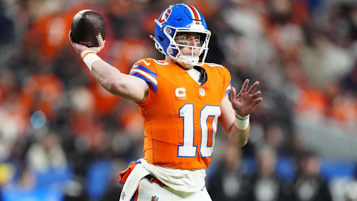 Nov 6, 2025; Denver, Colorado, USA; Denver Broncos quarterback Bo Nix (10) drops back to pass against the Las Vegas Raiders during the first half at Empower Field at Mile High. 