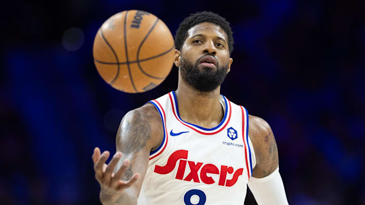 Mar 1, 2025; Philadelphia, Pennsylvania, USA; Philadelphia 76ers forward Paul George (8) catches a ball against the Golden State Warriors during the third quarter at Wells Fargo Center. Mandatory Credit: Bill Streicher-Imagn Images