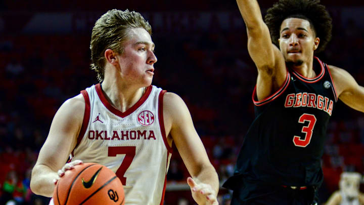 Oklahoma guard Dayton Forsythe drives against Georgia. Oklahoma guard Dayton Forsythe drives against Georgia.