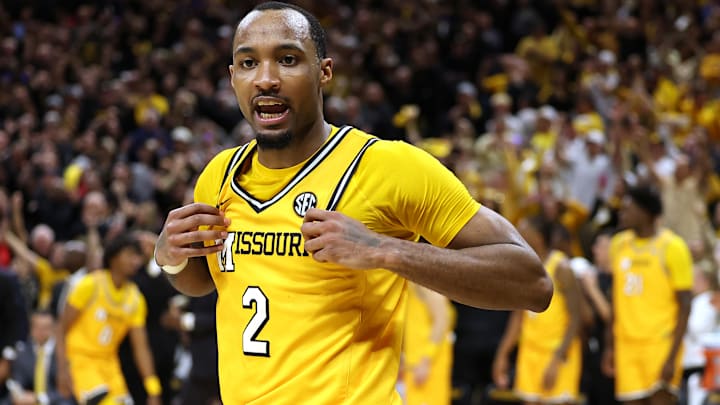 Missouri Tigers guard Tamar Bates (2) celebrates after an upset victory over rival Kansas Jayhawks.