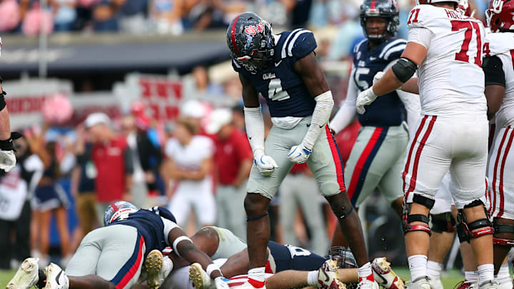 Oct 26, 2024; Oxford, Mississippi, USA; Mississippi Rebels linebacker Suntarine Perkins (4) reacts after a tackle during the second half against the Oklahoma Sooners at Vaught-Hemingway Stadium. Mandatory Credit: Petre Thomas-Imagn Images