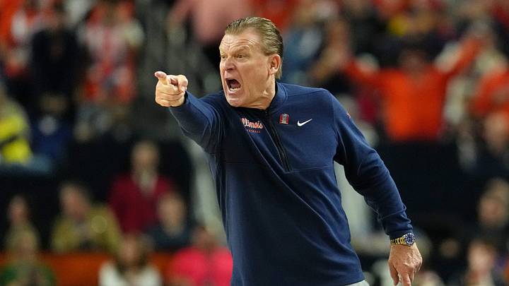 Apr 4, 2026; Indianapolis, IN, USA; Illinois Fighting Illini head coach Brad Underwood reacts after a play against the UConn Huskies during the first half of a semifinal of the Final Four of the men's 2026 NCAA Tournament at Lucas Oil Stadium. Mandatory Credit: Bob Donnan-Imagn Images Apr 4, 2026; Indianapolis, IN, USA; Illinois Fighting Illini head coach Brad Underwood reacts after a play against the UConn Huskies during the first half of a semifinal of the Final Four of the men's 2026 NCAA Tournament at Lucas Oil Stadium. Mandatory Credit: Bob Donnan-Imagn Images