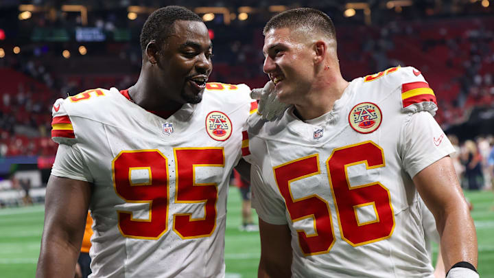Kansas City Chiefs defensive tackle Chris Jones (95) and defensive end George Karlaftis (56) talk after a victory over the Atlanta Falcons at Mercedes-Benz Stadium.