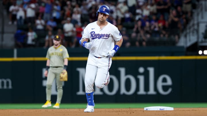 Jul 2, 2024; Arlington, Texas, USA;  Texas Rangers first baseman Nathaniel Lowe (30) runs the bases after hitting a two-run home run during the first inning against the San Diego Padres at Globe Life Field. Mandatory Credit: Kevin Jairaj-USA TODAY Sports
