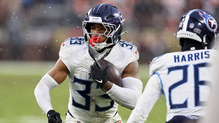 Dec 7, 2025; Cleveland, Ohio, USA; Tennessee Titans linebacker Cedric Gray (33) runs with the ball after recovering a fumble by Cleveland Browns running back Dylan Sampson (not pictured) during the fourth quarter at Huntington Bank Field. Mandatory Credit: Scott Galvin-Imagn Images