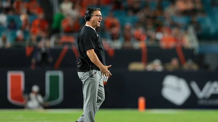 Nov 15, 2025; Miami Gardens, Florida, USA; Miami Hurricanes offensive coordinator Shannon Dawson reacts on the field against NC State Wolfpack during the fourth quarter at Hard Rock Stadium. Mandatory Credit: Sam Navarro-Imagn Images Nov 15, 2025; Miami Gardens, Florida, USA; Miami Hurricanes offensive coordinator Shannon Dawson reacts on the field against NC State Wolfpack during the fourth quarter at Hard Rock Stadium. Mandatory Credit: Sam Navarro-Imagn Images