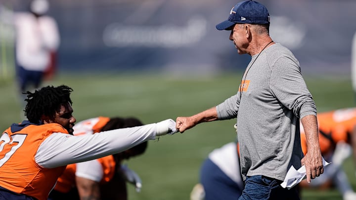Jul 23, 2025; Englewood, CO, USA; Denver Broncos head coach Sean Payton and defensive tackle Malcolm Roach (97) during Denver Broncos Training Camp. Mandatory Credit: Isaiah J. Downing-Imagn Images