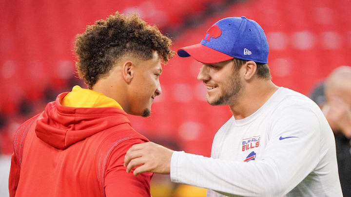 Kansas City Chiefs quarterback Patrick Mahomes (15) talks to Josh Allen.